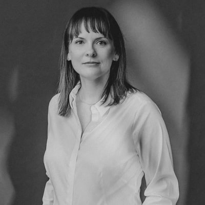 black and white image of Sigita Šaltė, Employee Experience Manager, HR Consultant, Evolvery